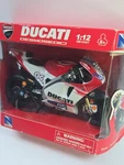 Newray 1:12 Ducati Desmosedici GP15 Andrea Dovizioso #04 Motogp 57723. Fixed Price $99.99.