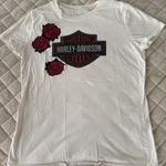 Harley Davidson - Women's Embroided Roses And Logo Tee. Fixed Price $25.99.