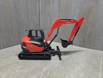 12" Long New Ray Orange Kubota KX080-4 Excavator. Fixed Price $25.00.