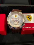 Ferrari Paddock Chronograph Watch Silver With Brown Leather Strap. Fixed Price $250.00.