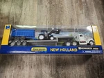 New Ray Toys 1:43 Kenworth Holland Farm Vehicles W900 Lowboy #16153. Fixed Price $26.38.