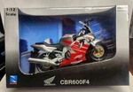 New-ray 1:12 Scale Road Rider Collection Silver/red Honda CBR600F4. Fixed Price $24.99.