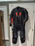 Dainese Laguna Seca 5 Perforated 1PC Leather Suit Perf. Black/fluo-red Size 60. Fixed Price $1100.00.