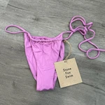 Nwt Stone Fox Swim Side Tie Bikini Bottoms Size Purple Women. Fixed Price $25.00.