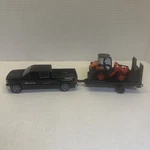 New Ray Toys Black Chevrolet Silverado Kubota Truck And Trailer With R630. Fixed Price $15.00.