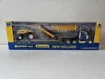 Kenworth Lowboy Trailer With New Holland Self Propelled Forage Harvester 16133. Fixed Price $34.99.