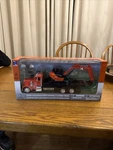 New Ray Peterbilt Flat Bed Truck & Kubota KX080-4 Excavator W/rocks 1/32 33383. Fixed Price $39.00.