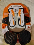 Like New Leatt Neck Brace 5.5 Gpx - White & Orange Small/medium. Fixed Price $110.00.