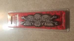 New Lethal Threat Tri-skulls Peel-n-stick Abs Emblem CE78034. Fixed Price $14.95.